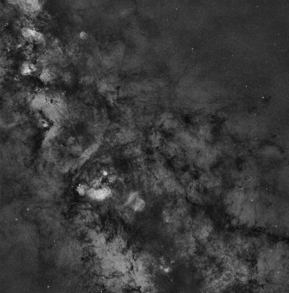 Star Adventurer GTi mosaic: the Lagoon Nebula is a large interstellar cloud in the constellation Sagittarius. Other names include Messier 8, M8, NGC 6523, Sharpless 25, RCW 146, and Gum 72. The photo was taken with Sky-Watcher's Star Adventurer GTi. | Details: six-frame mosaic in H-alpha | Rokinon 135mm f/2 | ZWO 2600MM | Baader 6.5nm H-alpha filter | 30 minutes per panel (180 minutes total exposure time)| Photo by Chris Hendren, technical support manager at Celestron. | Astronomy by Night